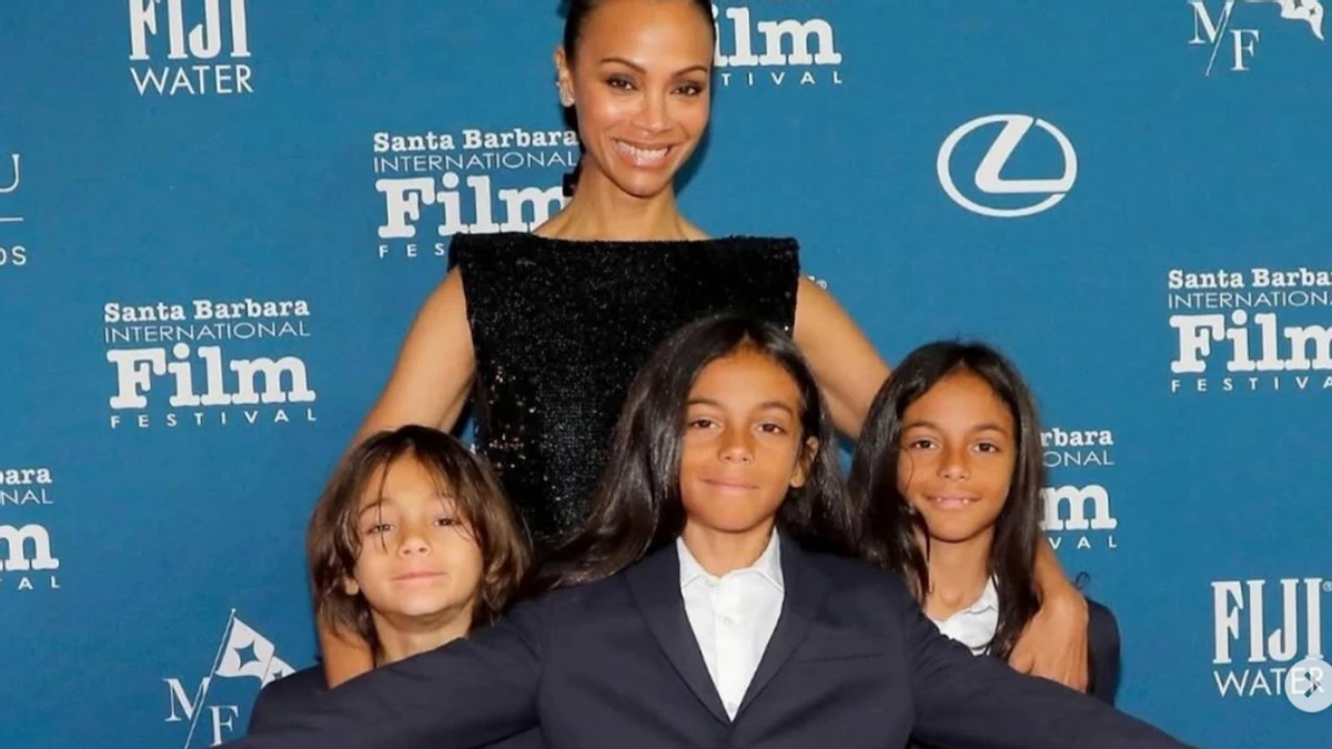 Blue and green suit her purse saldana dethroned johansson from the throne of hollywoods highest grossing actor